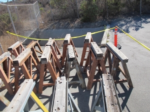 (21) HEAVY IRON SAW HORSES, (18 OUTSIDE, 3 WAREHOUSE). LOADING & HANDLING FEE $30-4599